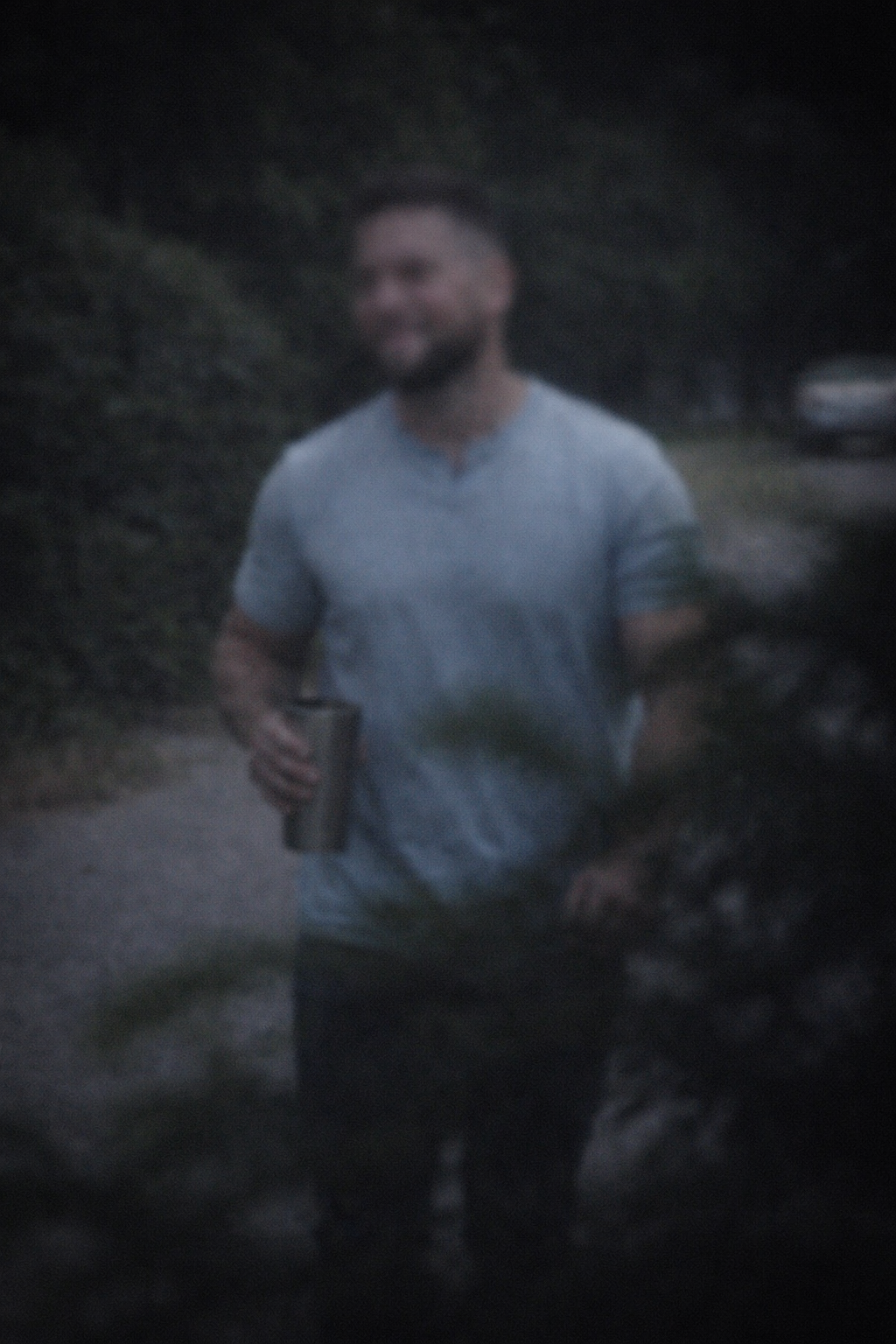 Surveillance still — subject observed off-duty